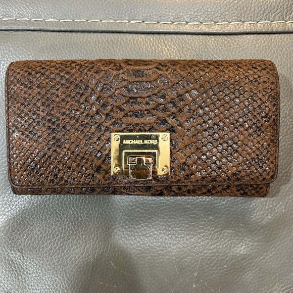 Michael Kors Handbags - Michael Kors Brown Embossed Snakeskin Leather Wallet. GUVC